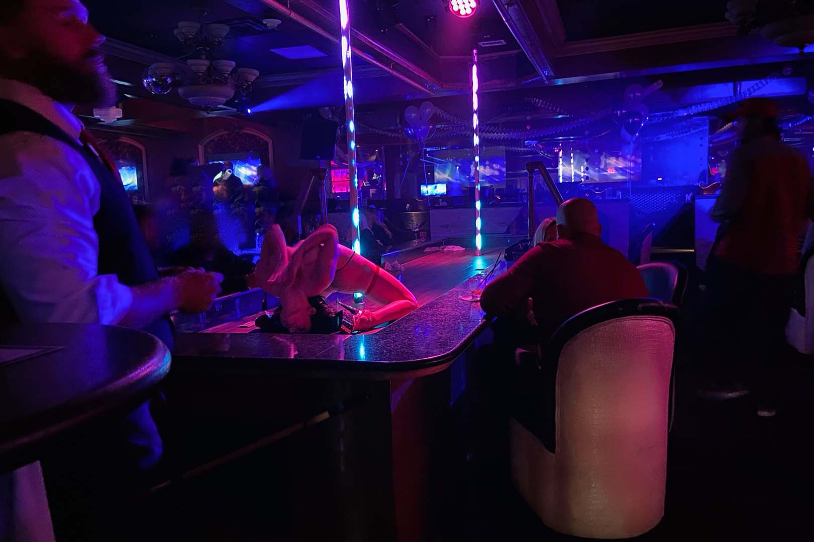 Guests at the bar and stage at Rachel's North in Casselberry, Florida